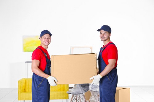 Furniture removal team preparing items for a Soho move
