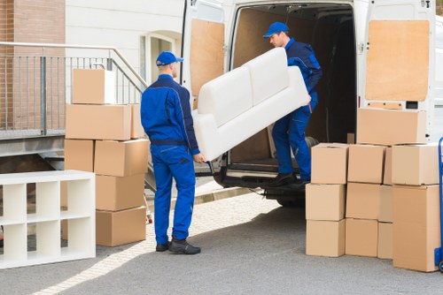 Man and van loading items in a busy Soho street