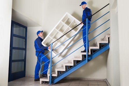 Business relocation specialists handling an office move in Soho with careful coordination