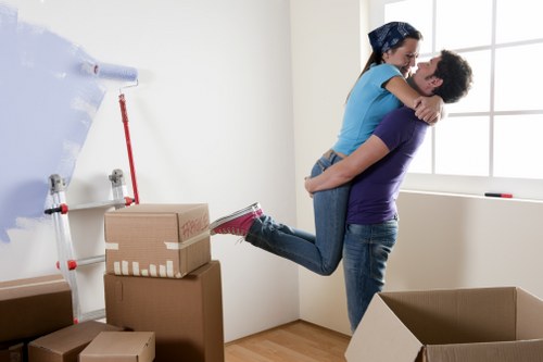 Secure office move setup in Soho with desks, computers, and organized relocation planning