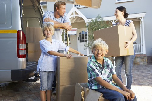 Professional movers handling furniture during a Soho relocation