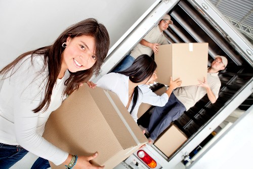 Removal team handling access challenges during a Soho apartment move